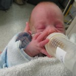 Toby Holding His Own Bottle