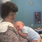 See how big I am on Mommy!